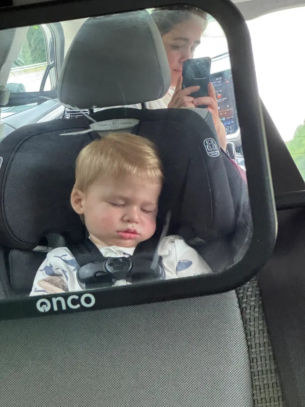 Malcolm, the Denesha grandson, fast asleep in his car seat